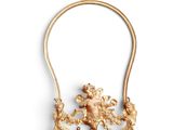 an image of a gold necklace on a white background