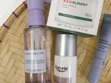 a basket with a lot of skin care products on it