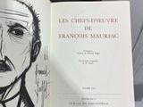 a drawing of a man in a suit and tie on a book