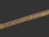 gros plan d'un bracelet en or sur fond noir