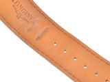 a close up of a brown leather watch strap on a white surface