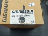 a box with a camera inside of it on a table