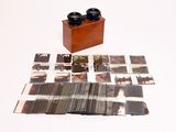 a wooden box that has a bunch of photos on it