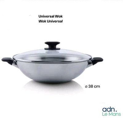 a pan with a lid sitting on a white surface