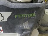 a close up of a duster with a sticker on it