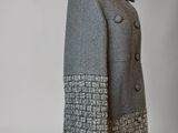 grey and black coat on a mannequin mannequin mannequin mannequin mannequin mannequin mannequin mannequin manne