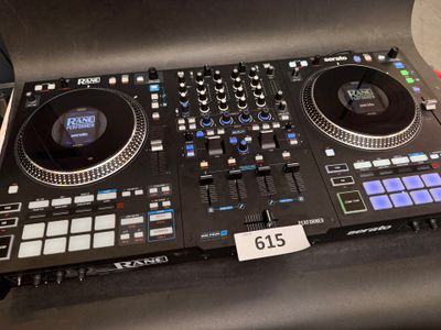 the dj controller is sitting on top of the table