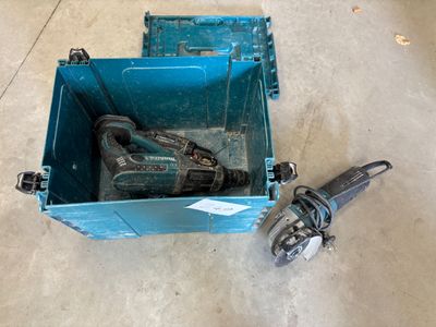 a blue box with a drill and a tool in it