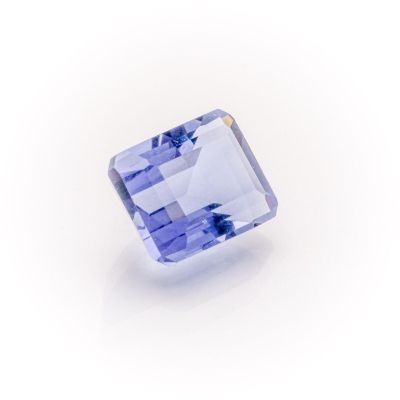 a blue sapphire stone on a white background