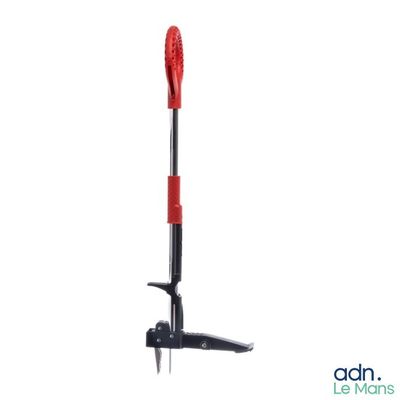 a close up of a red and black garden tool on a white background