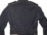 the back of a black jacket with a zippered collar