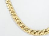 an image of a gold necklace on a white background