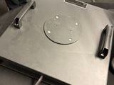 a laptop computer sitting on top of a table