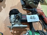 a lot of tools on a table with a price tag