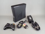 a video game system and a game controller on a table