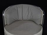an image of a chair with a cushion on top of it