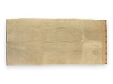 a piece of brown paper with rivets on it on a white surface