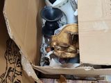 a box full of items that are sitting on the floor