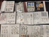 many different types of stamps on a table
