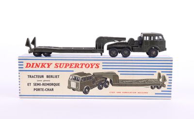a toy truck with a trailer attached to it ' s back