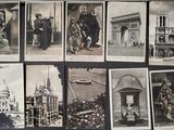 several black and white photographs of people and buildings on a wall