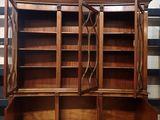 two bookshelves in the middle of a room