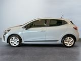 the silver car is parked in the garage on the concrete floor