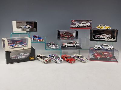 many different models of cars in a display case