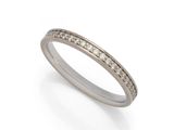 a white gold ring with diamonds on a white background