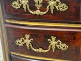 an image of a chest of drawers in a room