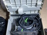 a tool box with a hose and a tool in it