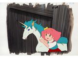 animation cel of a girl and a unicorn in front of a door