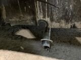 a close up of a car ' s tire with a wren on it