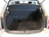 a trunk of a car with the back seats folded down