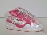 pink and white hello kitty shoes with a pink bow on the side