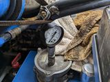 a close up of a pressure gauge on a machine