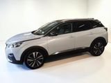 a picture of a white suv parked in a showroom