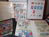 many different types of stamps on the pages of a book