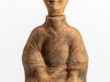 an image of a statue of a woman with a goat head on her head
