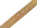 a close up of a gold watch strap on a white background