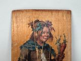 a painting of a woman holding a carrot in her hand