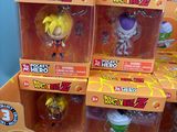 dragon ballz keychains are in a display case