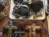 a lot of religious items on the table