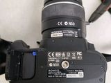 a camera that is sitting on a table with a camera attached to it