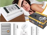a picture of a woman laying in bed with a remote control