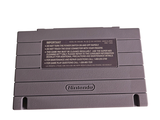 a nintendo game console sitting on top of a white table