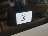 a close up of a computer monitor with an apple logo on it