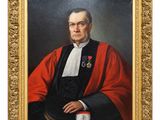an oil painting of a man in a red robe and black mantler