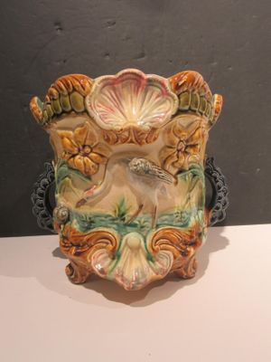 a vase that is sitting on a table in a room