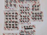 several pieces of paper with red and black writing on them